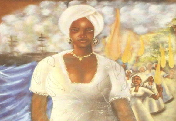 Representação de Maria Felipa, mulher negra vestida de branco com turbante. Divulgação: Casa Maria Felipa